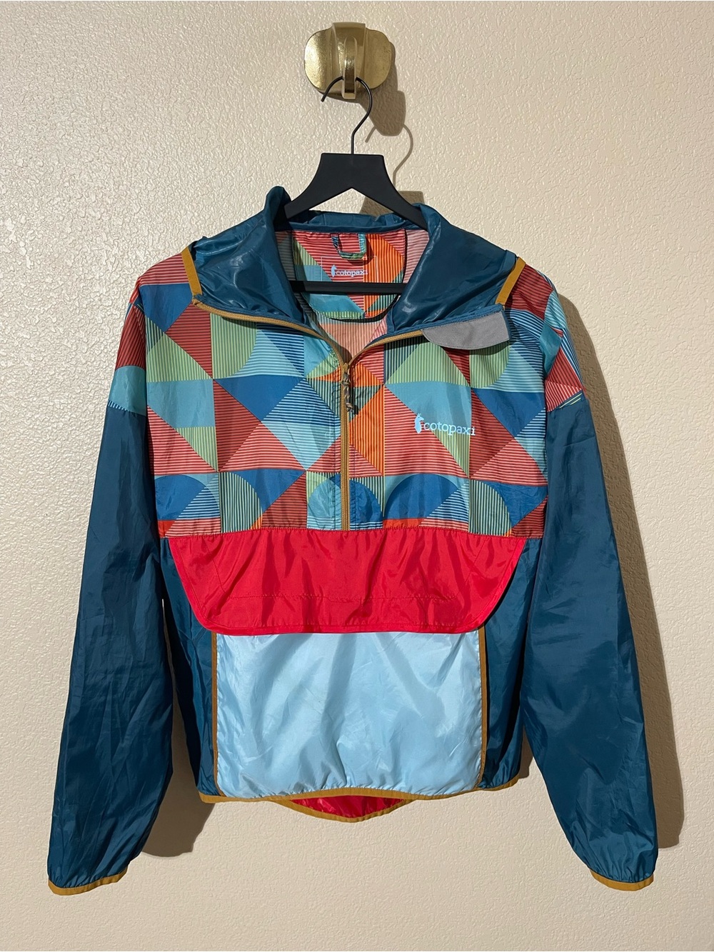 cotopaxi Geometric Colorblock Half-Zip Jacket in Teal, Red, Light Blue, Green